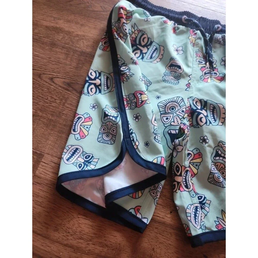 Tommy Bahamas Tiki pattern boys swim trunks size 8